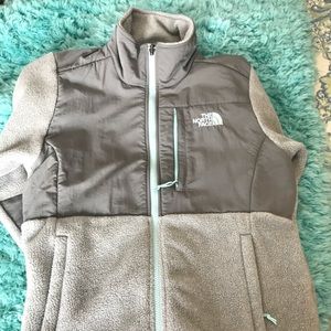 Gray North Face jacket with wind proof chest